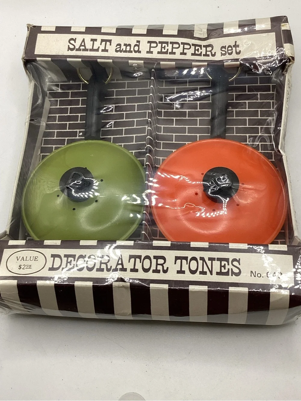 set of mid-century plastic frying pan salt and pepper shakers